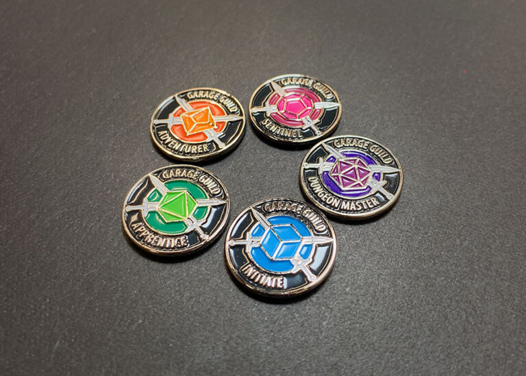 Garage Guild enamel pins