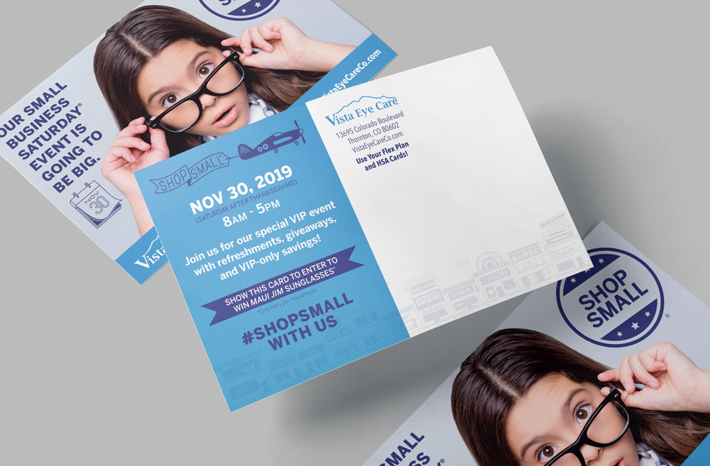 Postcard featuring young girl with glasses on one side and #ShopSmall promotional text on the other side