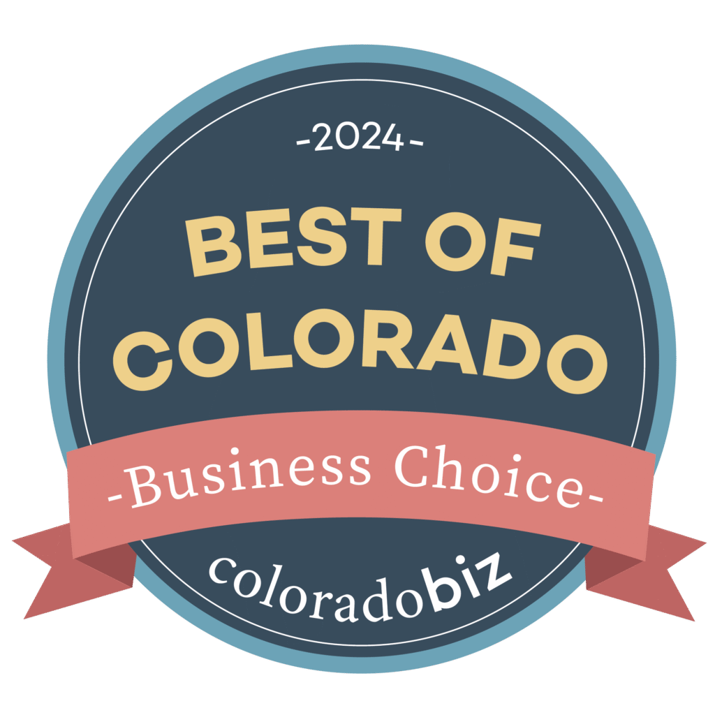 Best Graphic Design Firm in Denver--a blue circle and a pink ribbon with the words "2024 Best of Colorado Business Choice ColoradoBiz."