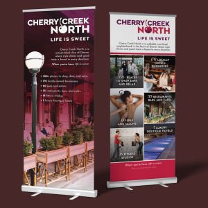 Retractable banners for Cherry Creek North